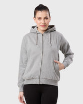 Woman wearing a grey hoodie