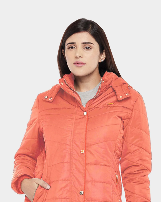 A woman in Kosha's waterproof fleece lined jacket.