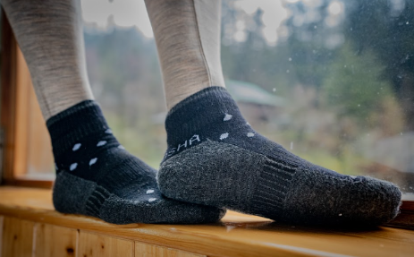 Kosha men's socks with premium materials, offering warmth, a snug fit, moisture-wicking, and odor control.