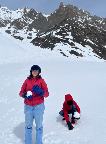 Kids in cozy puffer jackets and gloves enjoying in the snow while staying warm so parents can relax too.