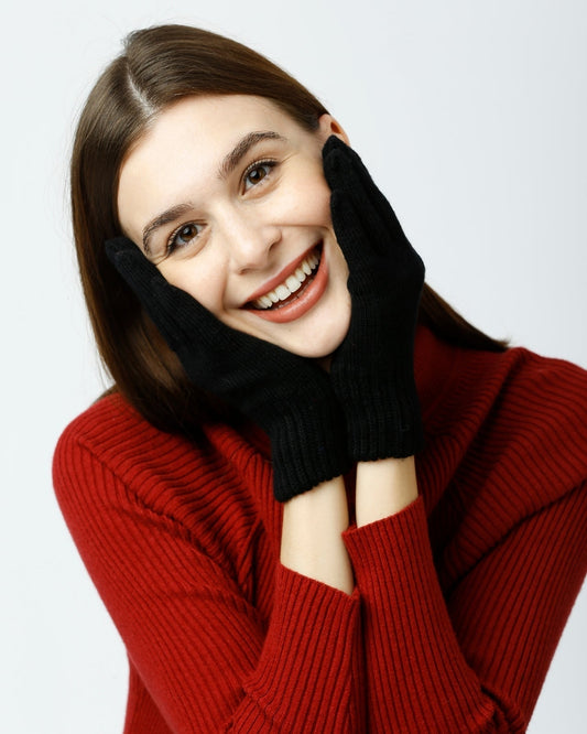A woman in a sweater pullover, enjoying. 