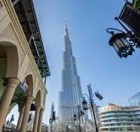 A panoramic view of Dubai's skyline with modern skyscrapers, showcasing the city's blend of tradition and innovation.