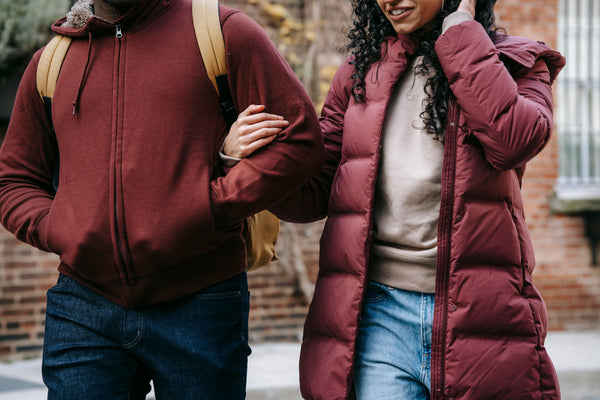 Photo by Keira Burton of a couple walking on city streets