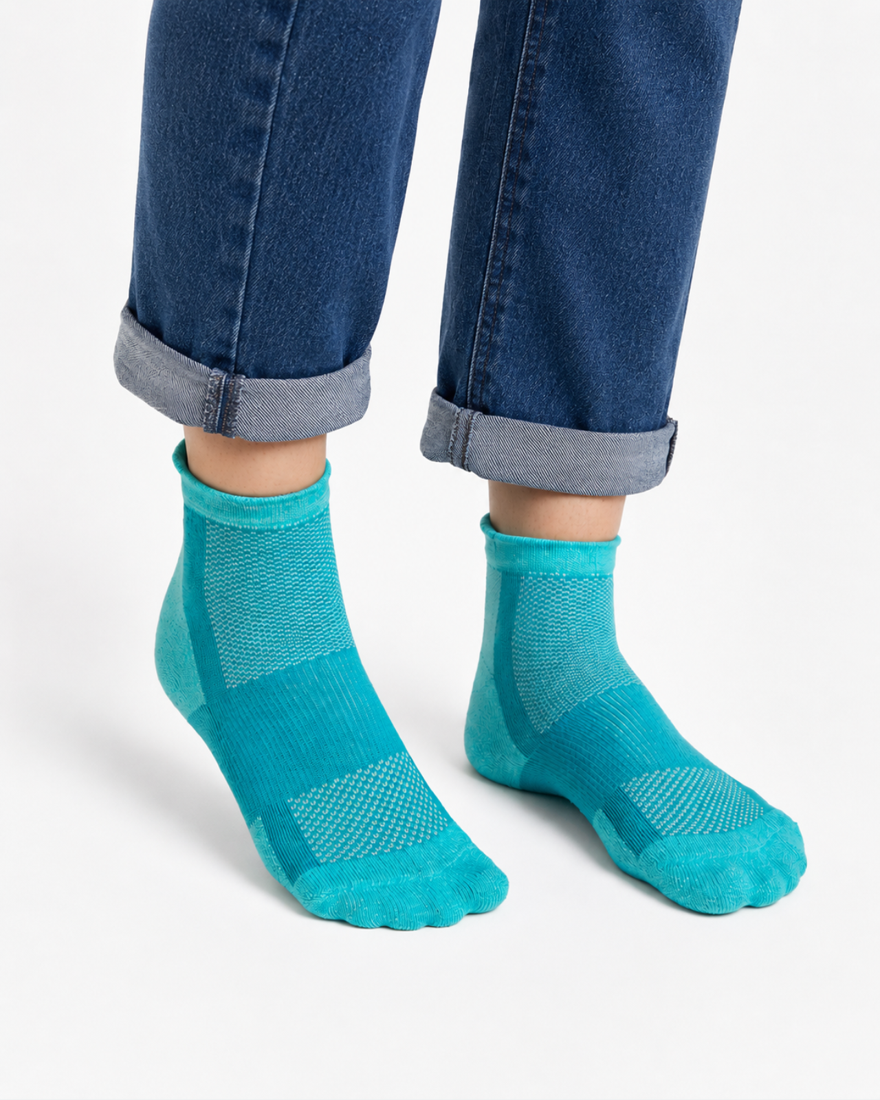 A pair of teal blue quarter length technical socks worn 